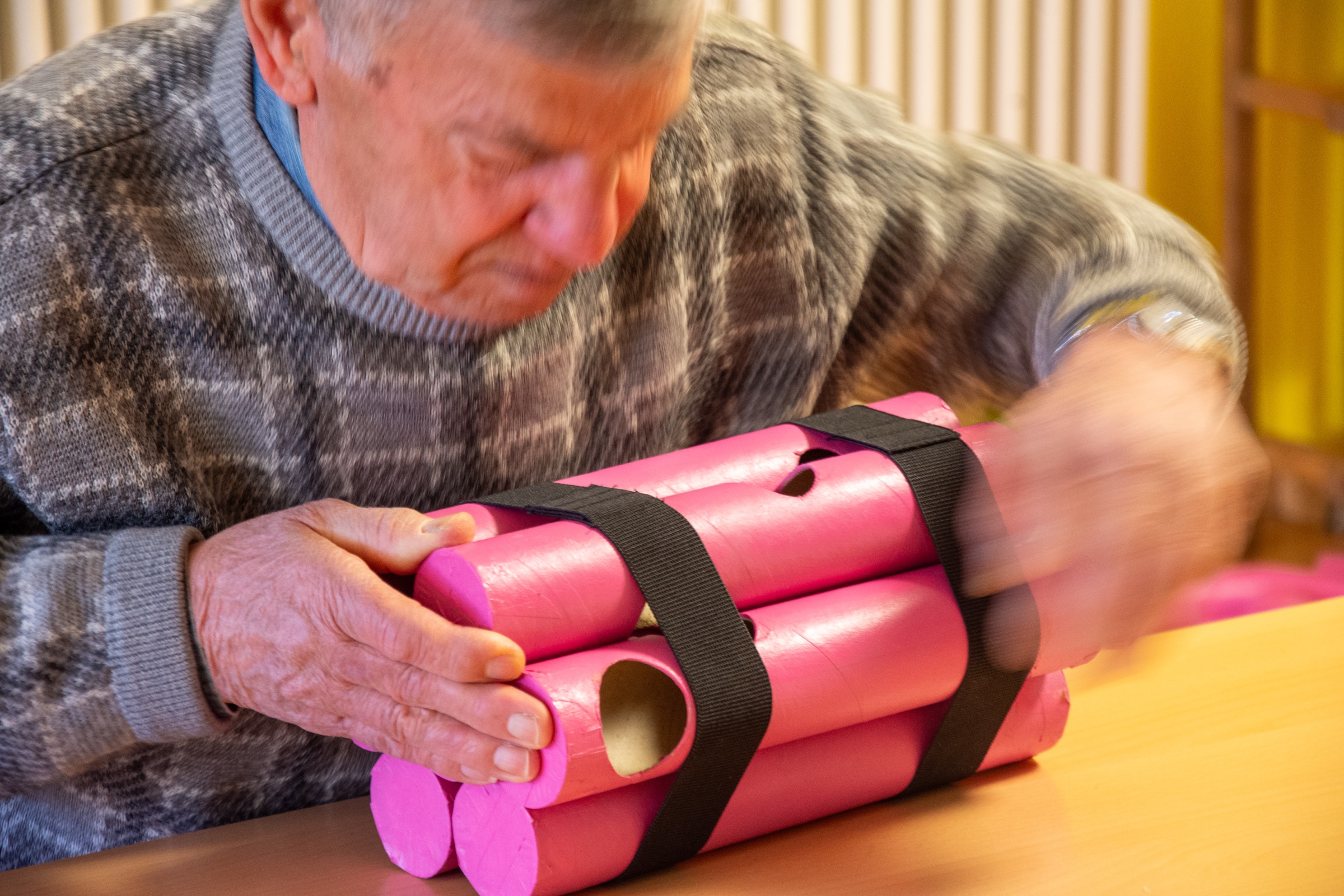 Elderly participant interacting with the pipe run game